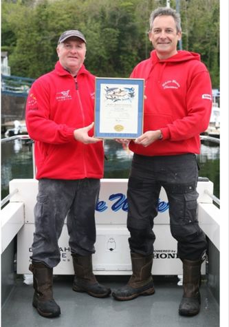Andrew Alsop with Andy Griffith with his grand slam IGFA award 